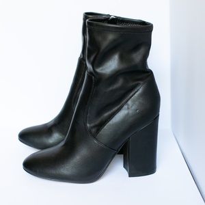Black leather booties by Marc Fisher size 7.5.